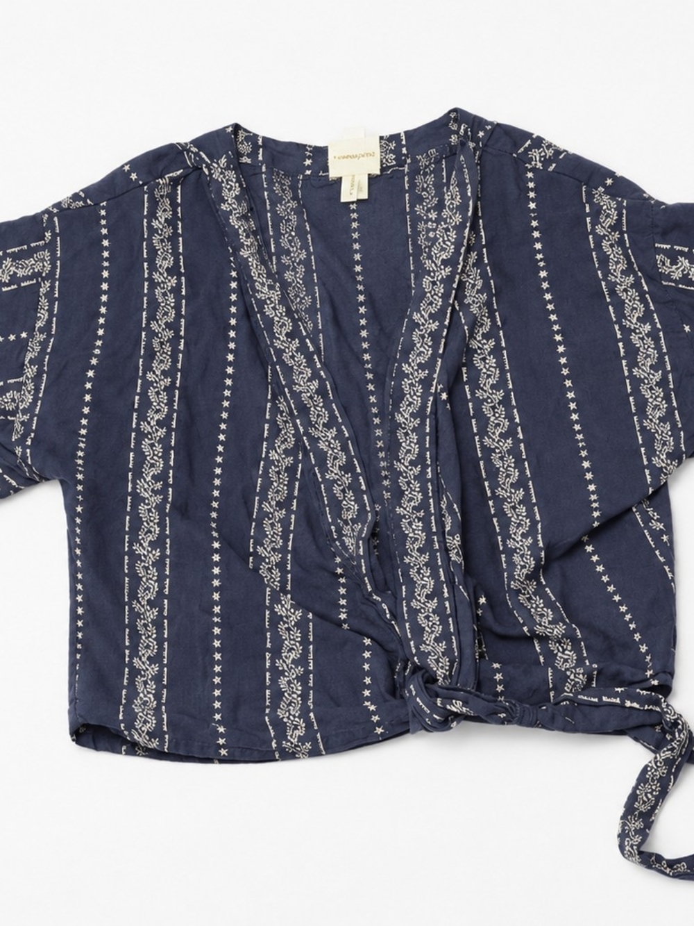 Lightweight Japna boho wrap top featuring an allover blue and ivory floral strip